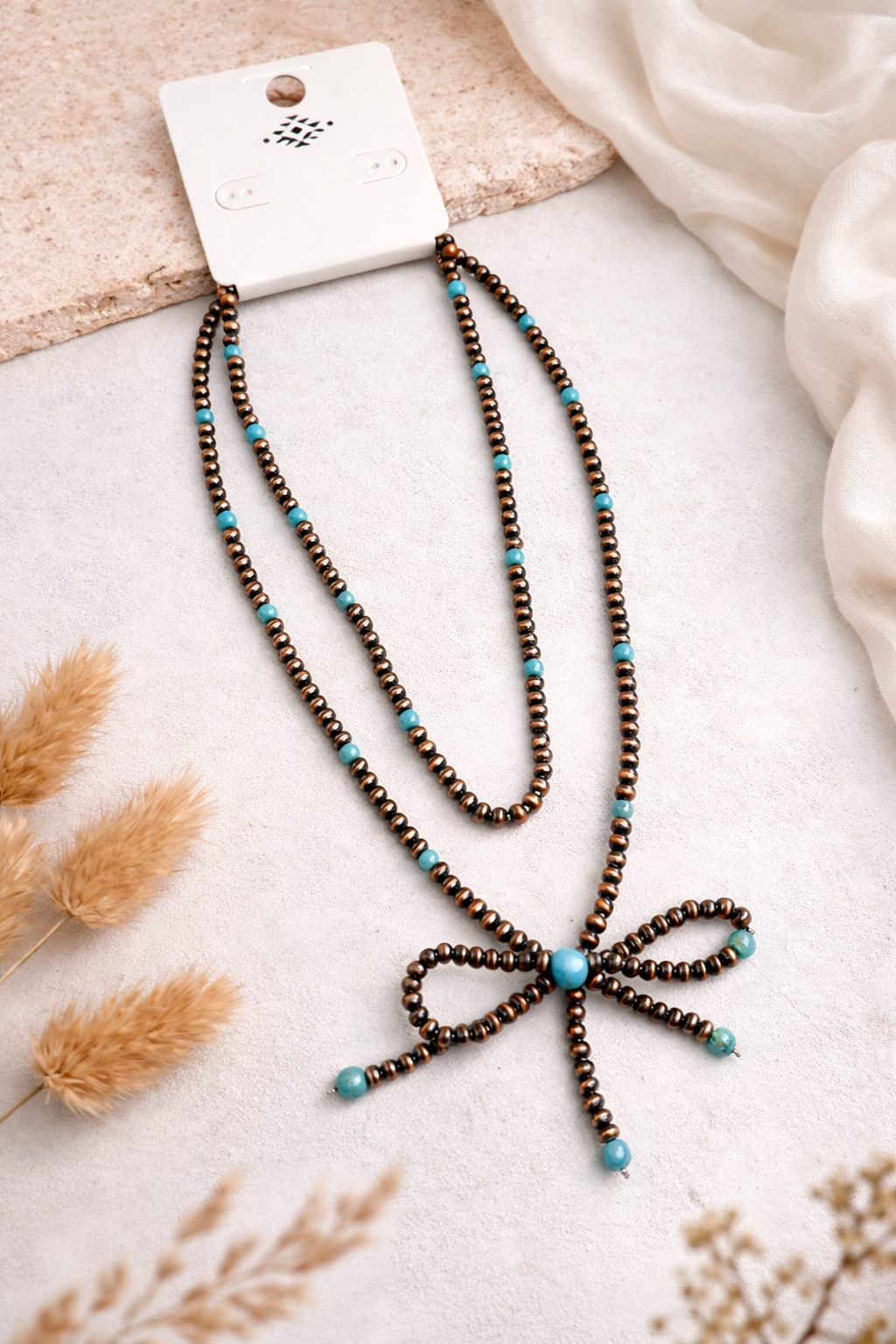 Bow Necklace (m)